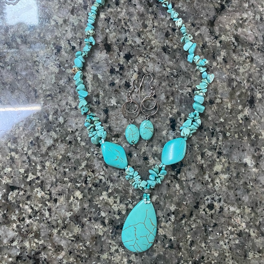 Turquoise colored stone necklace and earrings